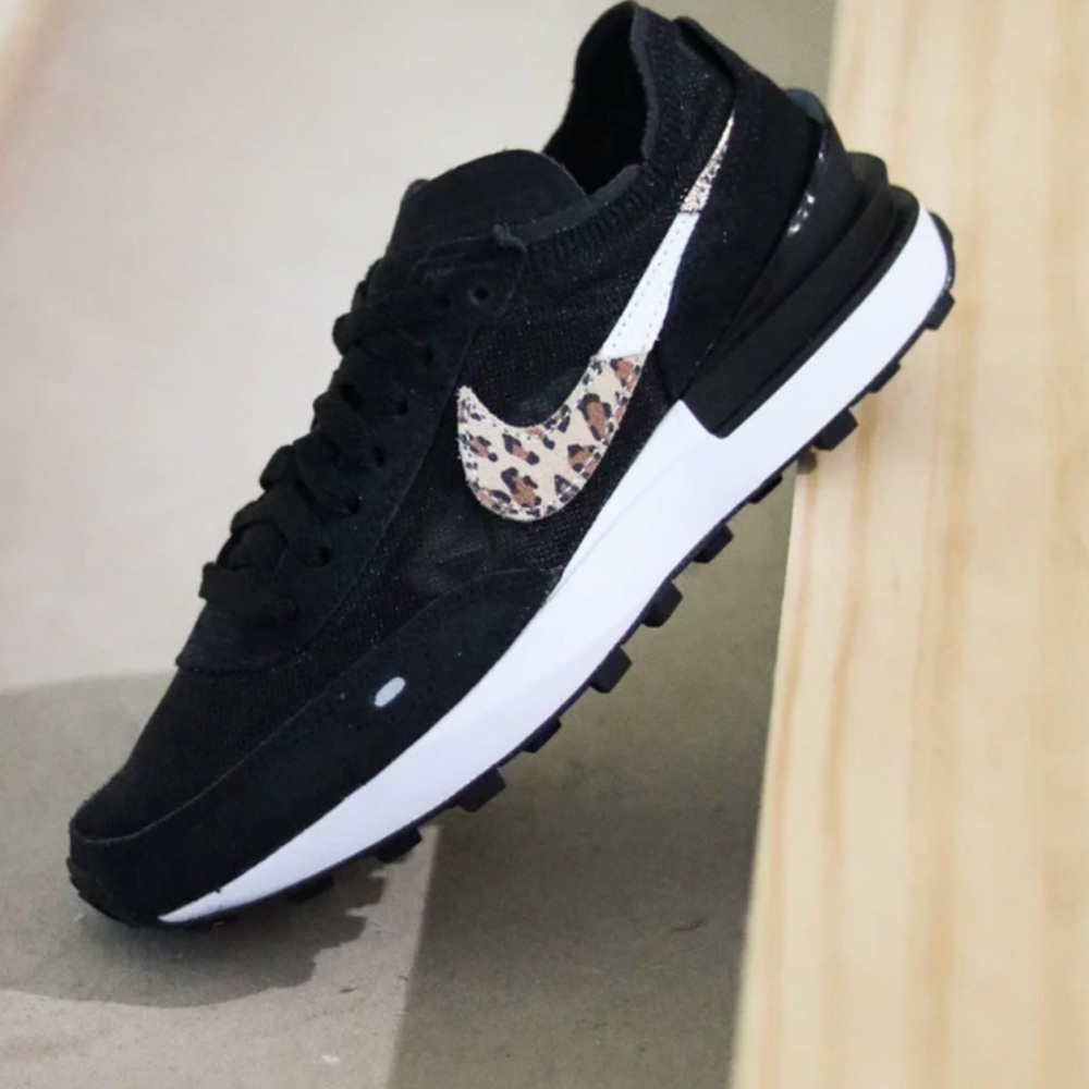 Nike Women's Black Sneakers with White Midsole and Leopard Swoosh